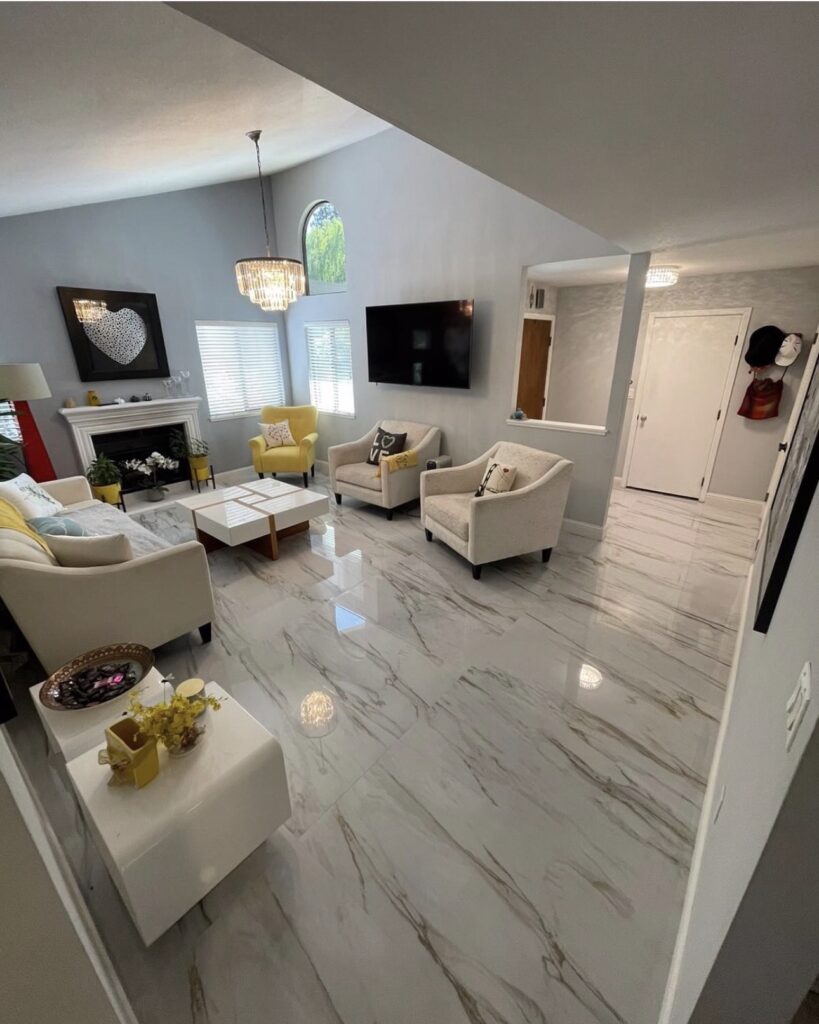 Polished marble-look porcelain floor in an open living space