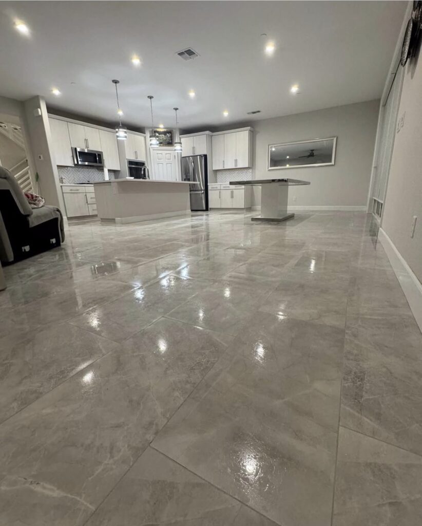 Glossy tile floor in a kitchen and dining area