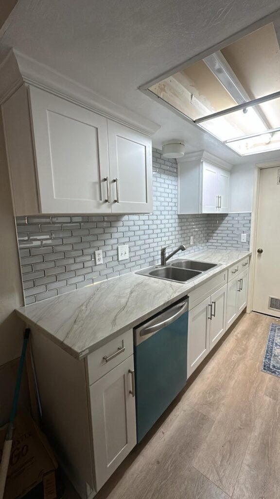 Kitchen with mosaic and subway tile backsplash